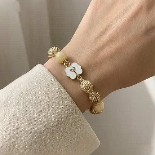Elegant Flower Charm Gold Bracelet